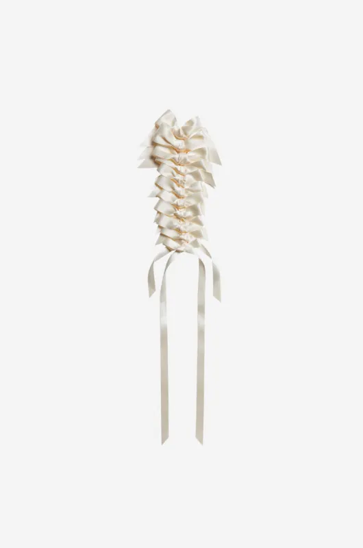 Long Rosette Bow Brooch sold by Simone Rocha