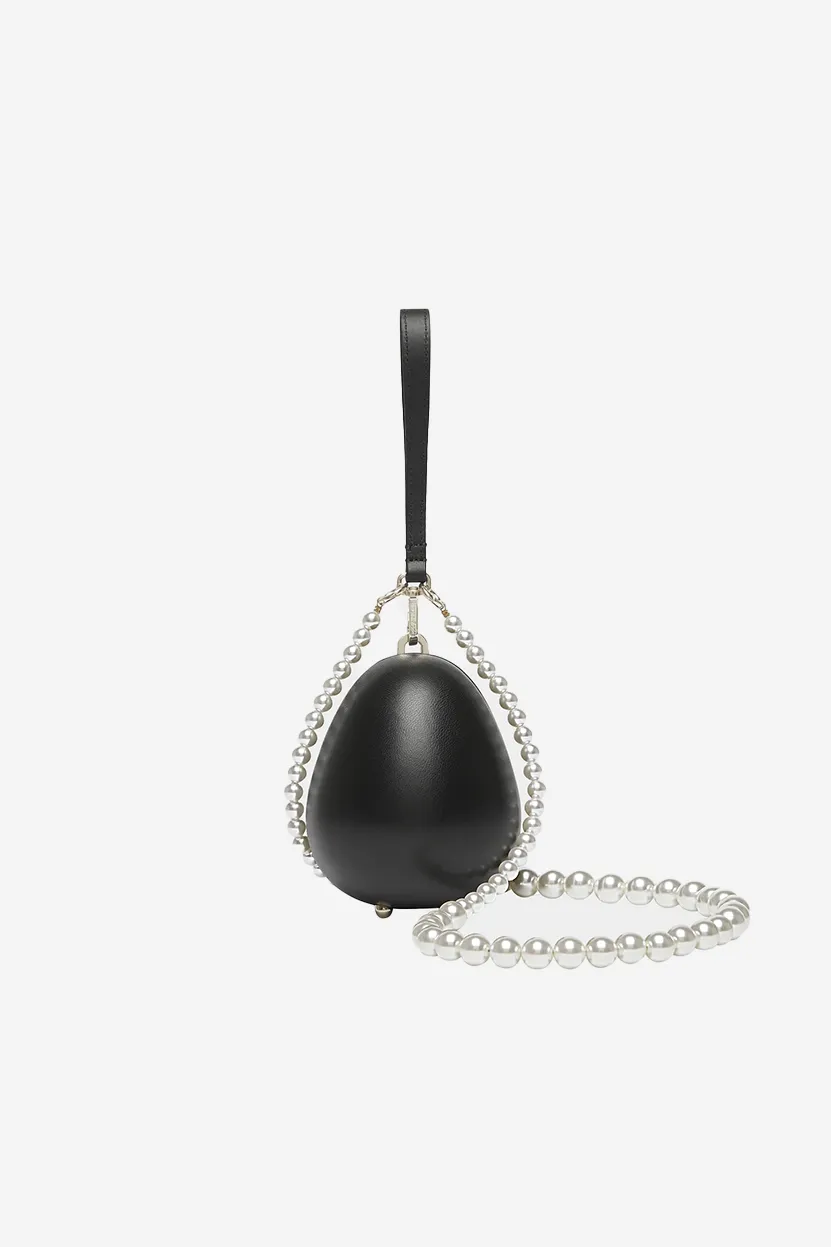 Micro Handheld Egg Bag With Pearl Crossbody Strap sold by Simone Rocha