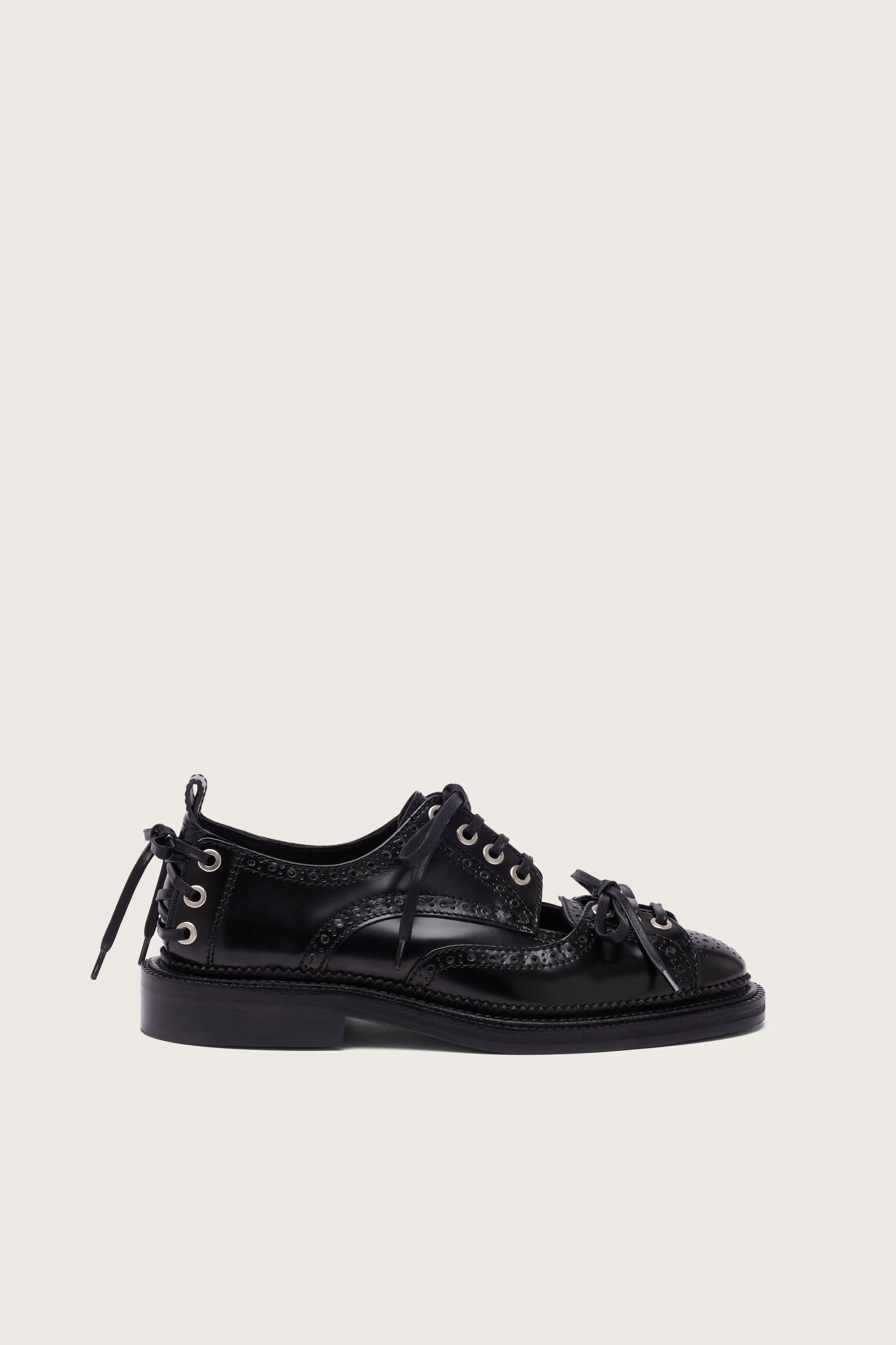 Multi-Lace Cutout Brogue sold by Simone Rocha