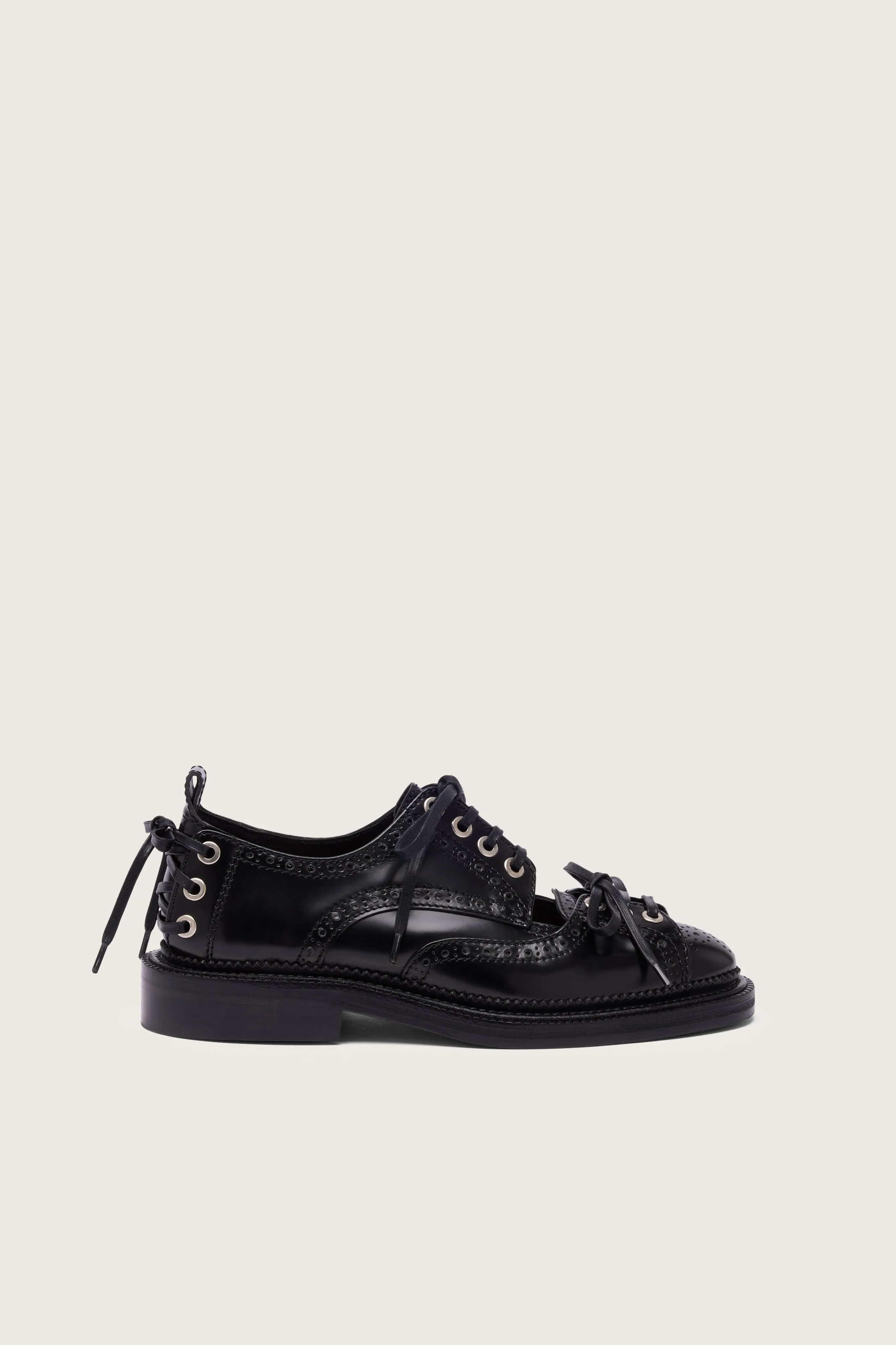 Multi-Lace Cutout Brogue sold by Simone Rocha