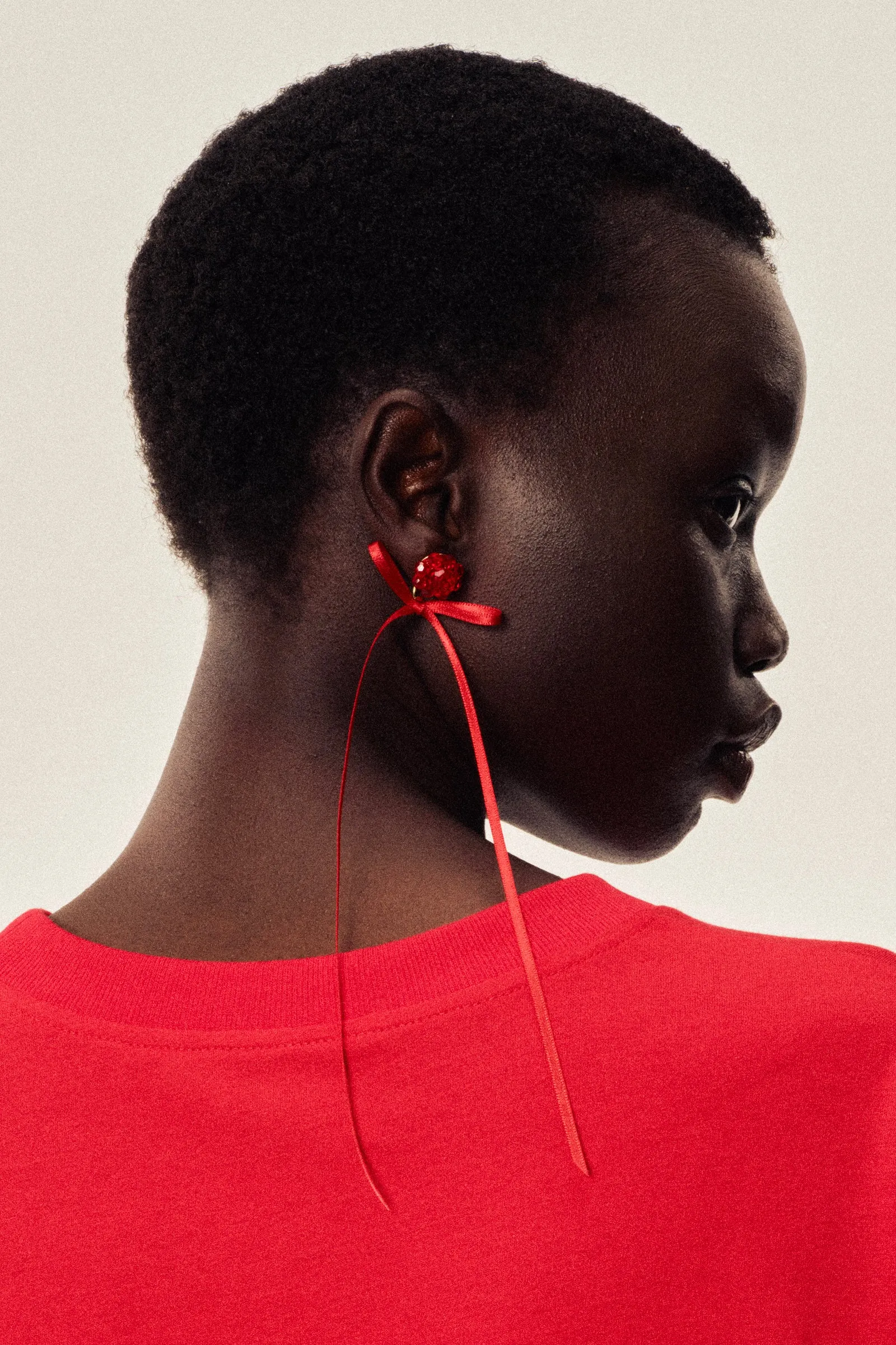 Slim Bow Ribbon Stud Earrings sold by Simone Rocha