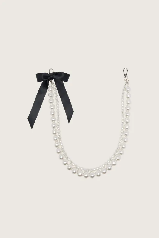 Pearl Bow Strap sold by Simone Rocha