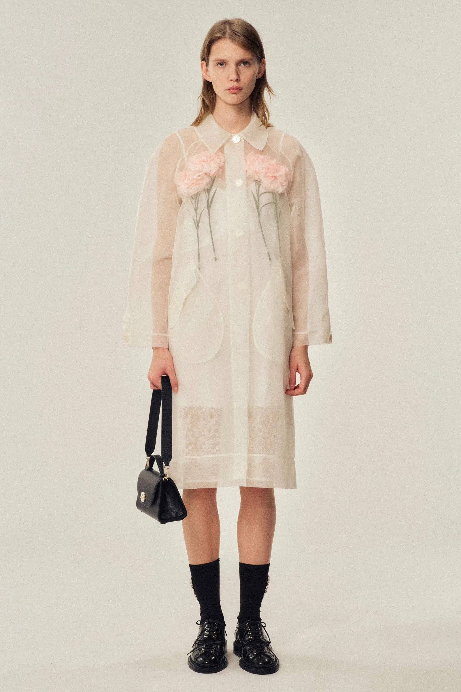 Stuffed Carnation Car Coat sold by Simone Rocha