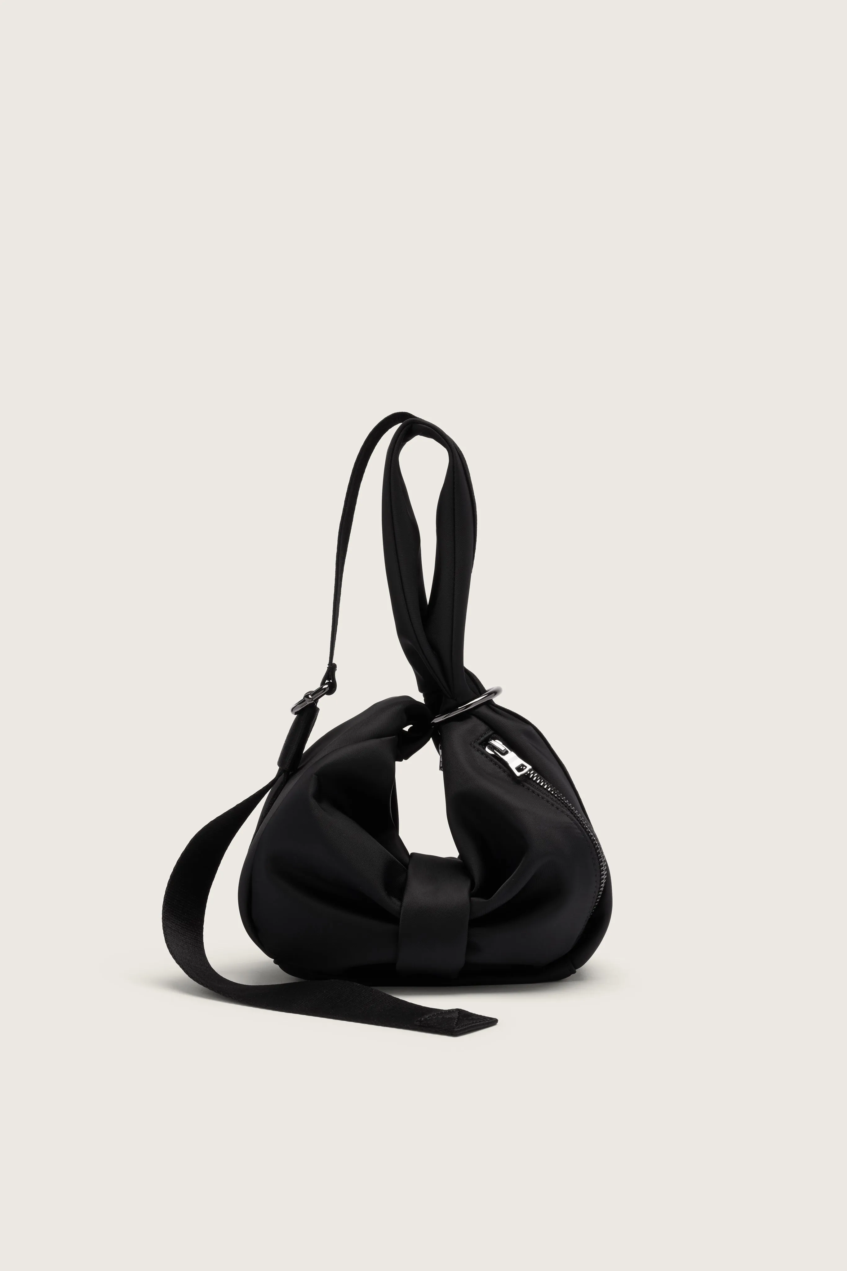 Mini Sling Bow Bag sold by Simone Rocha