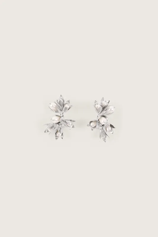 Encased Pearl Flower Cluster Earrings sold by Simone Rocha