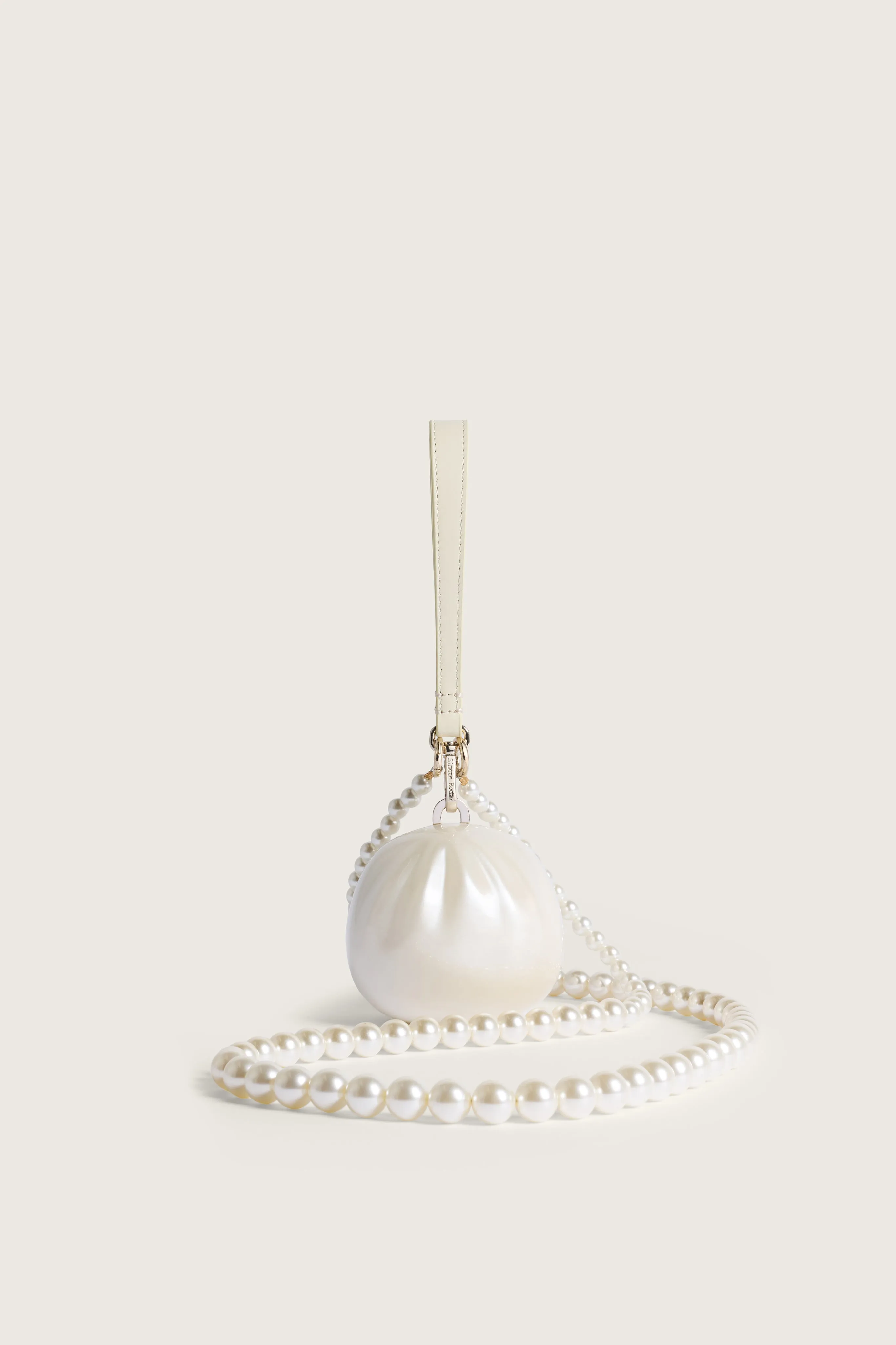 Pearl Crossbody Dim Sum Bag sold by Simone Rocha