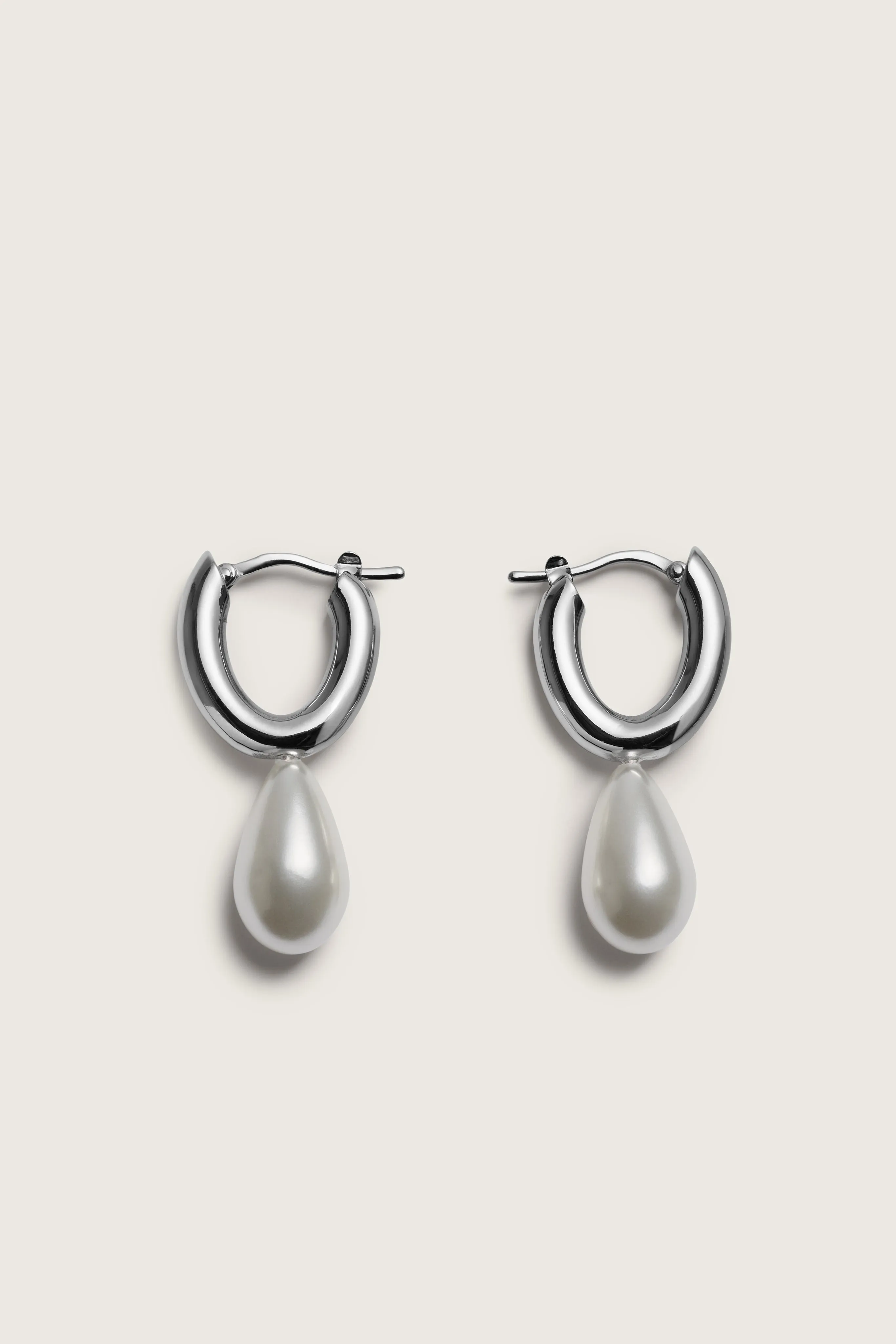Pearl Hoop Earrings sold by Simone Rocha