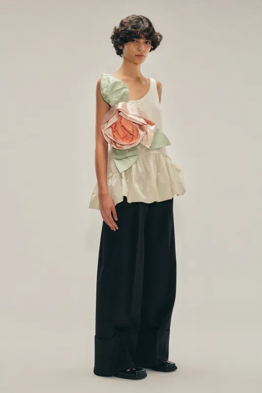 Pressed Rosette Tilted Neck Peplum Top made by Simone Rocha