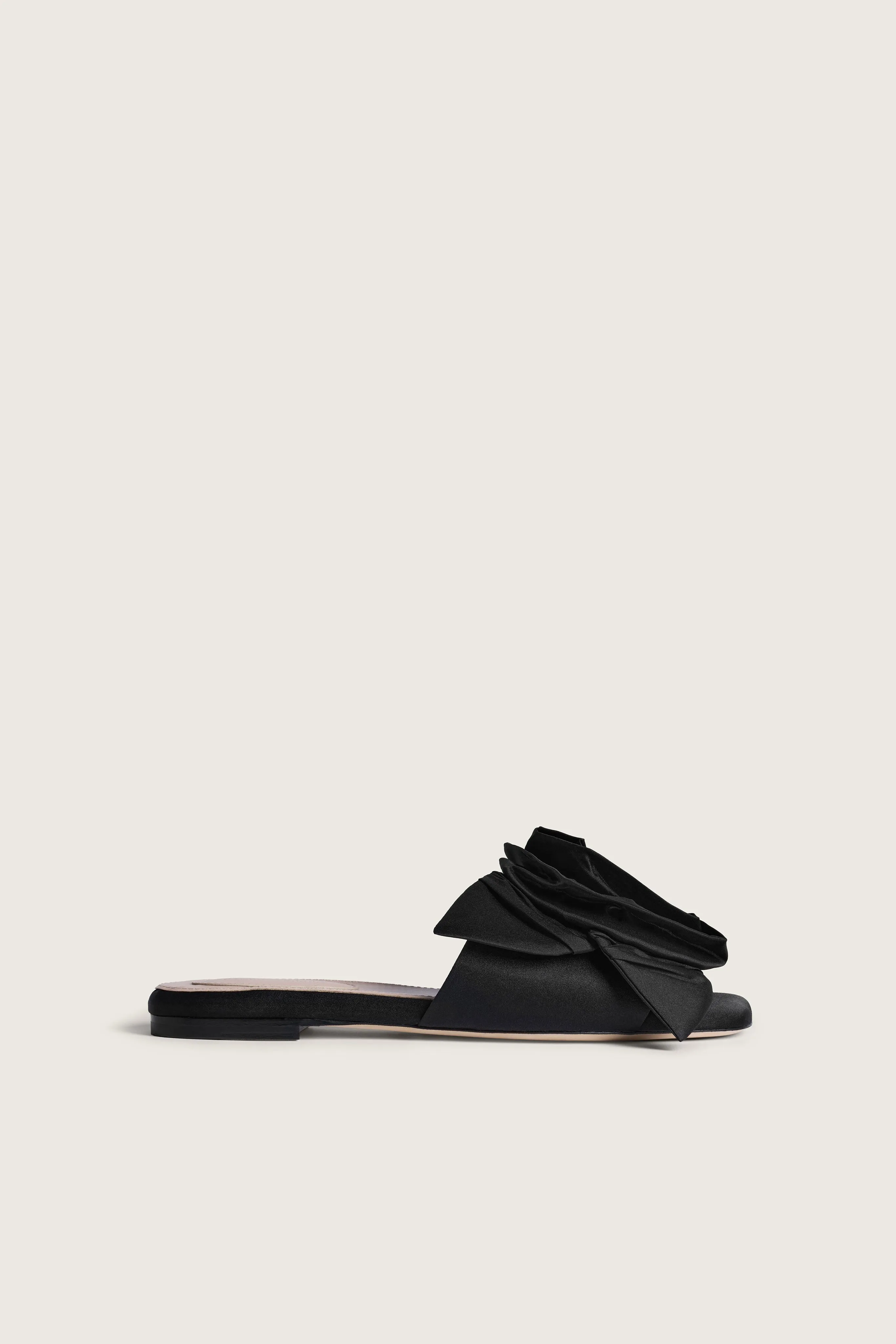 Pressed Rosette Slide sold by Simone Rocha