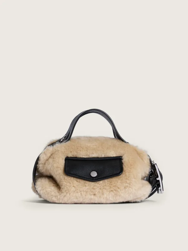 Mini Faux Fur Biker Belt Bag made by Simone Rocha