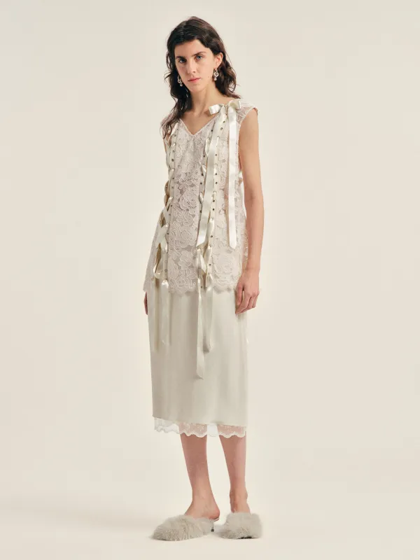 Unraveling Ribbon Portrait Top made by Simone Rocha