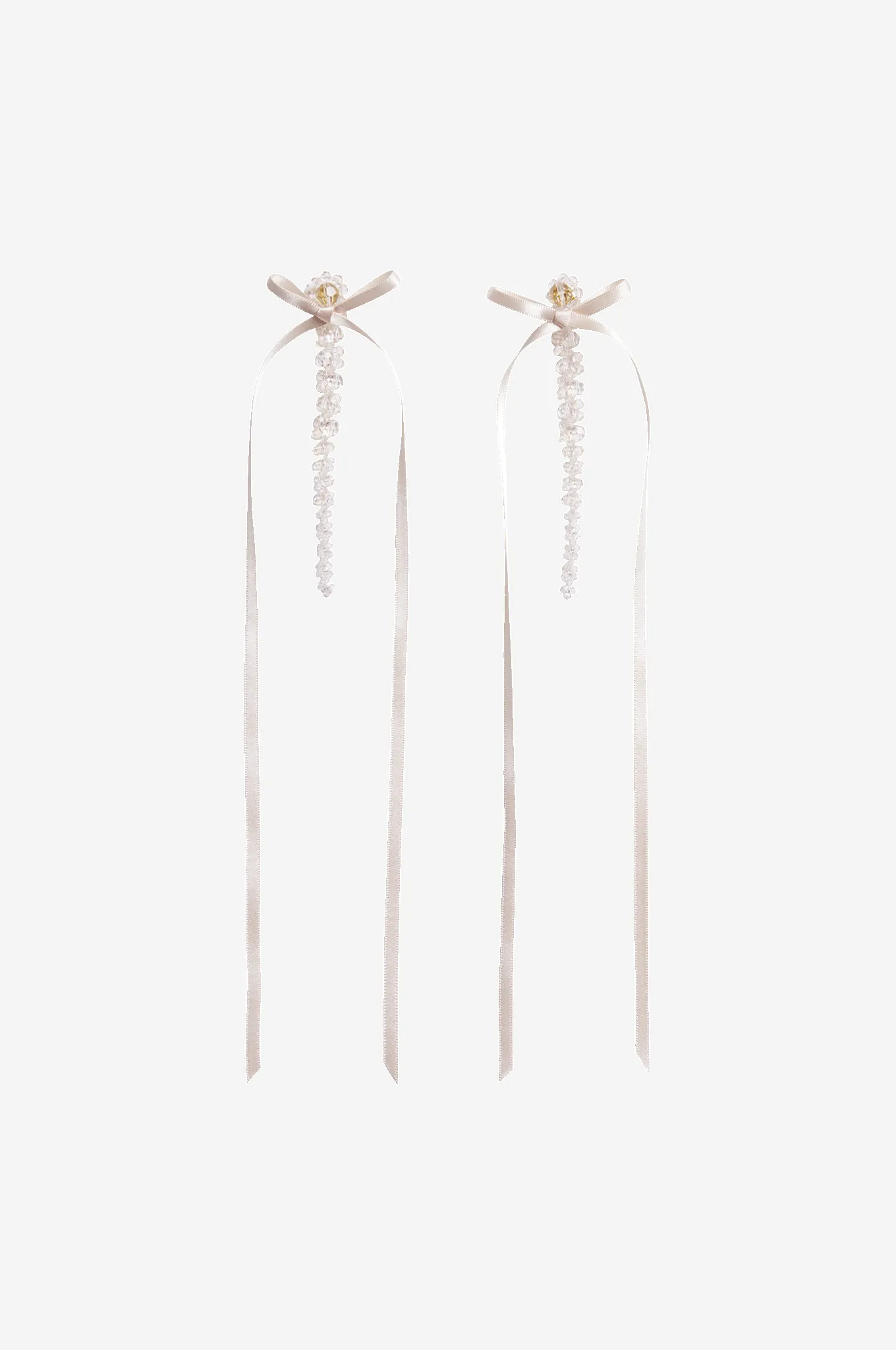 Bow Ribbon Drip Earrings sold by Simone Rocha