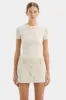 Sandrine Button Mini Skirt sold by SIR the label