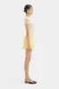 Sandrine Button Mini Skirt sold by SIR the label