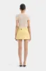 Sandrine Button Mini Skirt sold by SIR the label