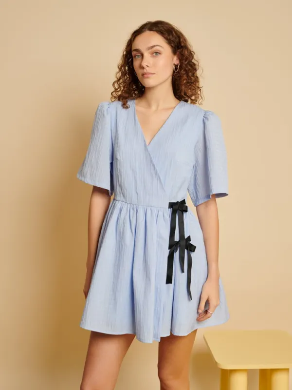 <b> Ghospell </b> Freja Wrap Mini Dress sold by Sister Jane