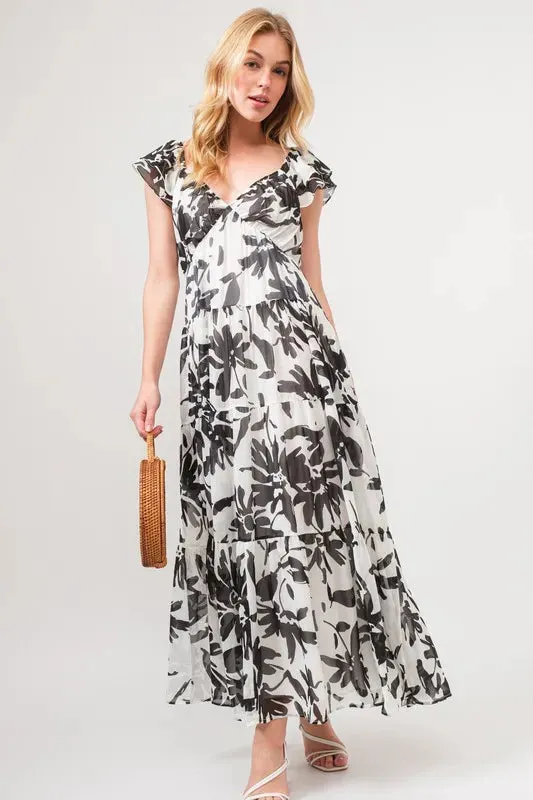 Ruffled Sleeve Tiered Floral Print Maxi Dress sold by Skemo