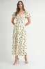Polka Dot Puff Sleeve Midi Dress sold by Skemo