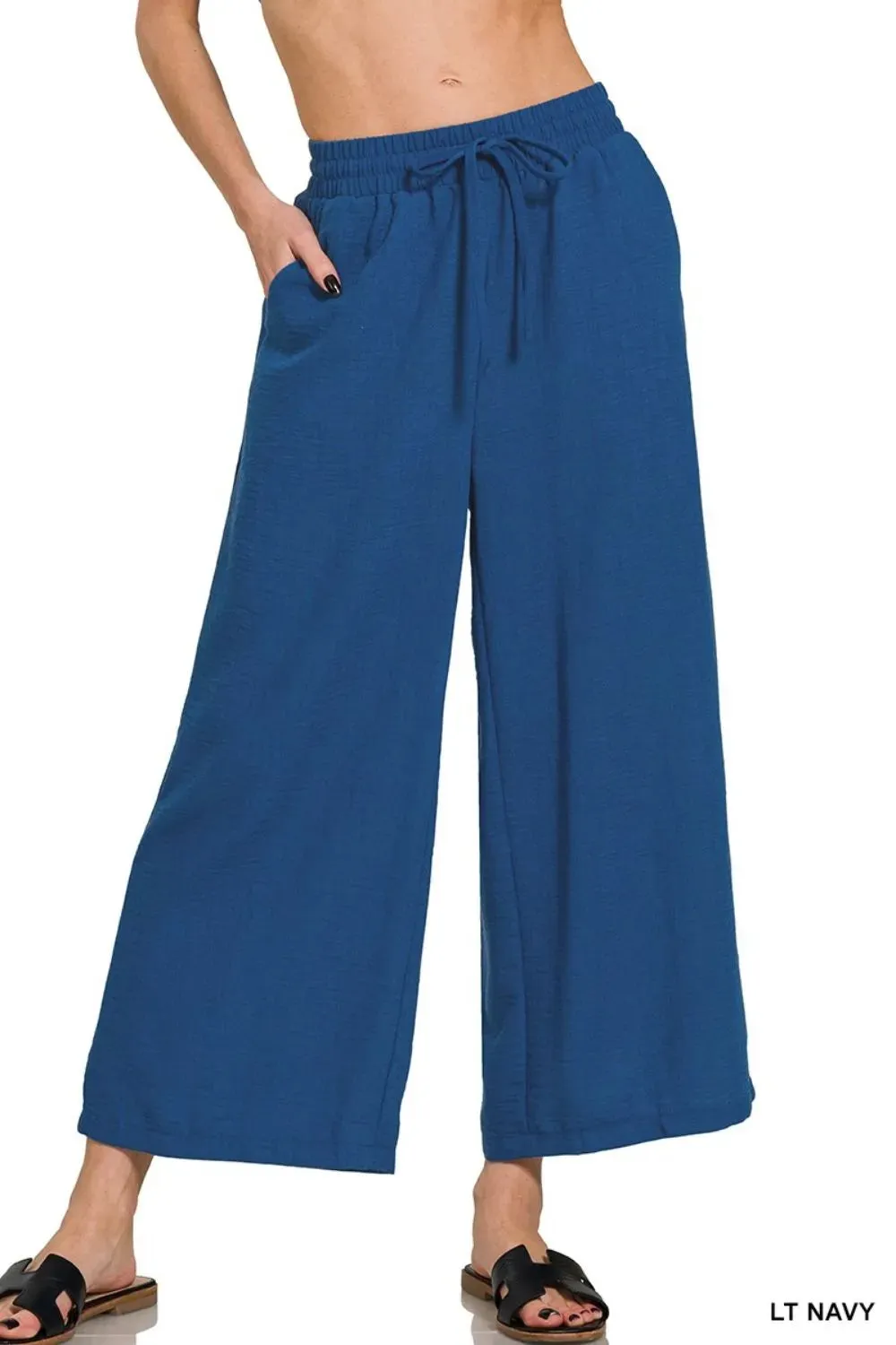 Woven Crepe Elastic Band Waist Cropped Pants sold by Skemo