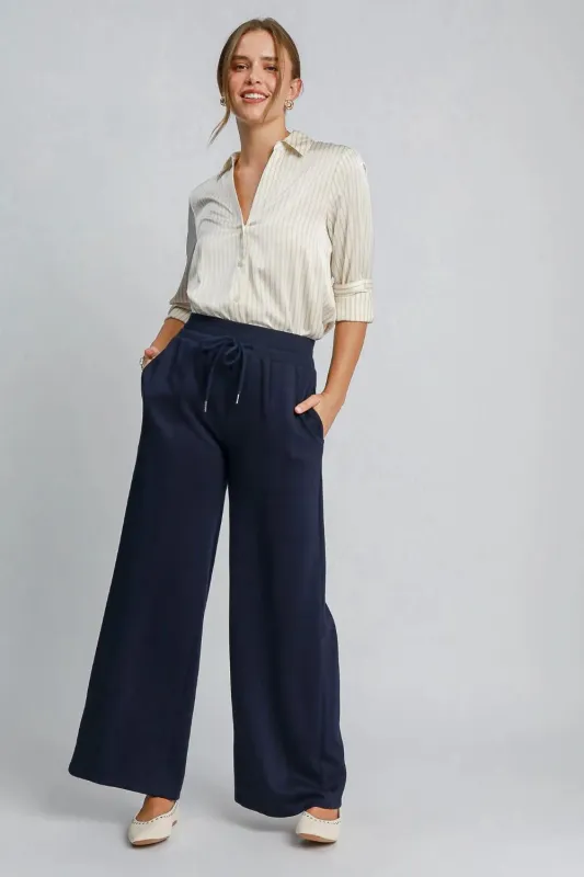 Drawstring Wide Leg Pants with Pockets sold by Skemo