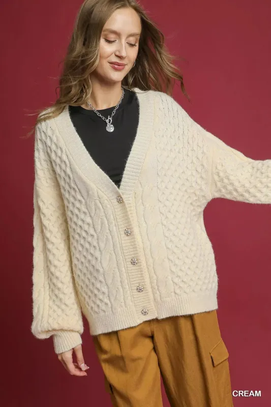 Cable Knit Pearl Button Cardigan sold by Skemo