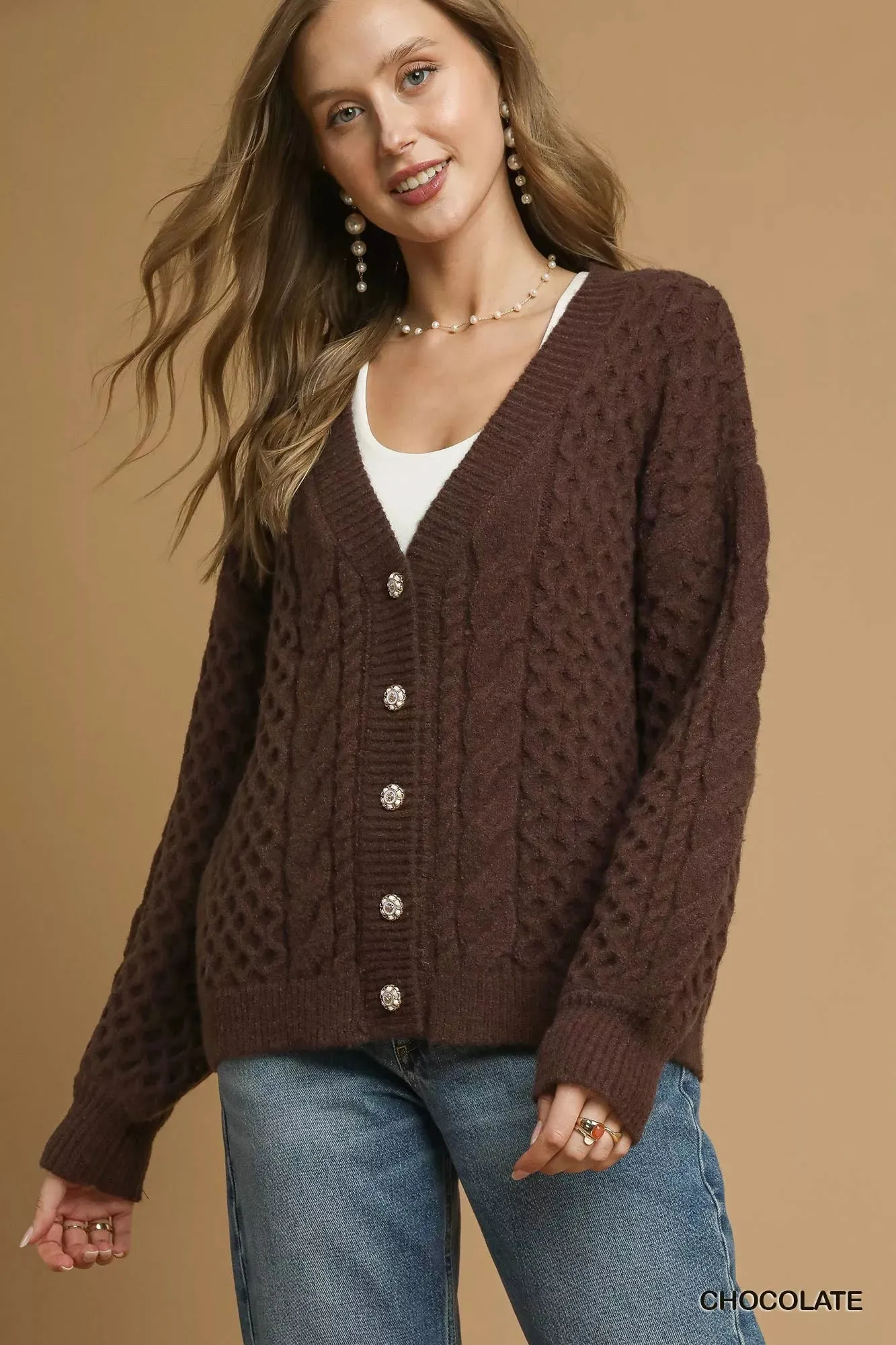 Cable Knit Pearl Button Cardigan sold by Skemo