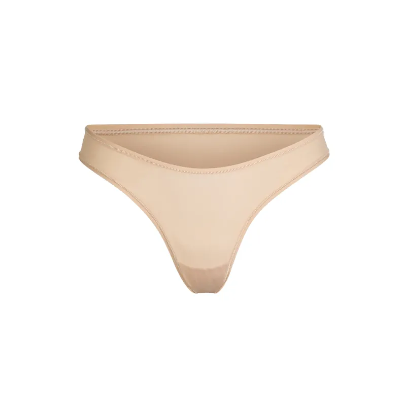 FITS EVERYBODY DIPPED FRONT THONG | CLAY sold by SKIMS