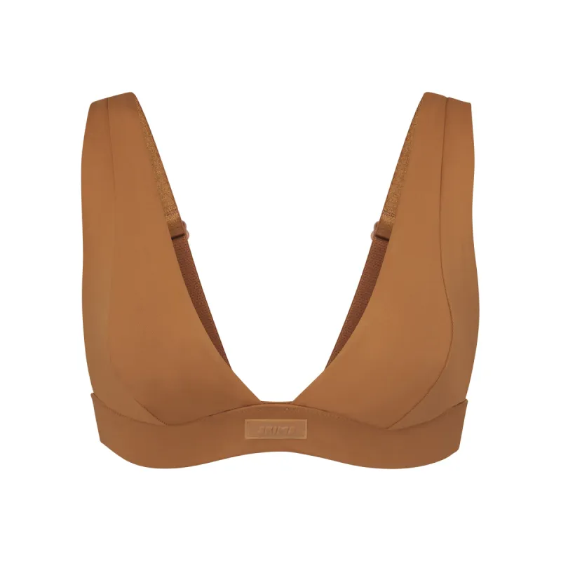 SIGNATURE SWIM PLUNGE BIKINI TOP | ALMOND sold by SKIMS