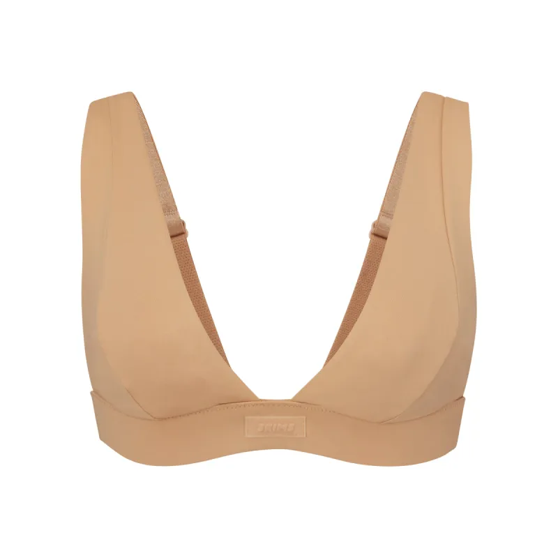 SIGNATURE SWIM PLUNGE BIKINI TOP | OCHRE sold by SKIMS