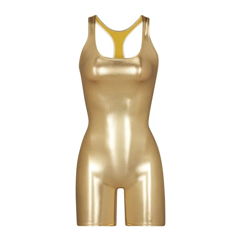 METALLIC SWIM CYCLE SUIT | GOLD sold by SKIMS