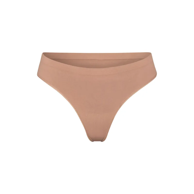 SOFT SMOOTHING SEAMLESS THONG | SIENNA sold by SKIMS