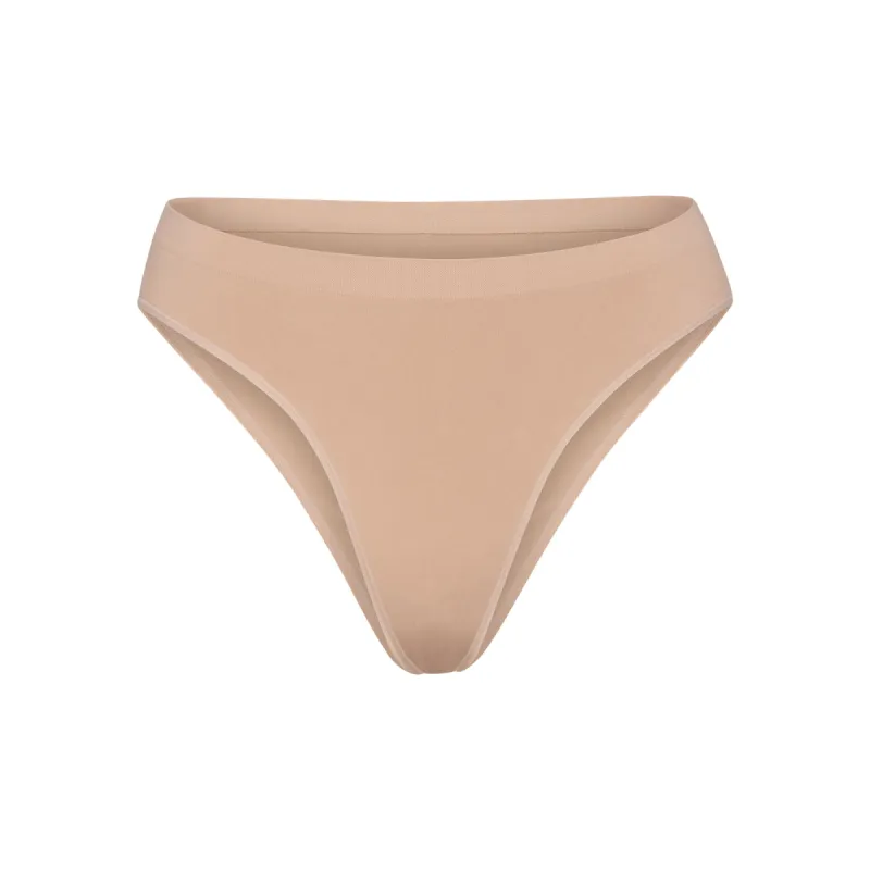 SOFT SMOOTHING SEAMLESS BRIEF | CLAY sold by SKIMS