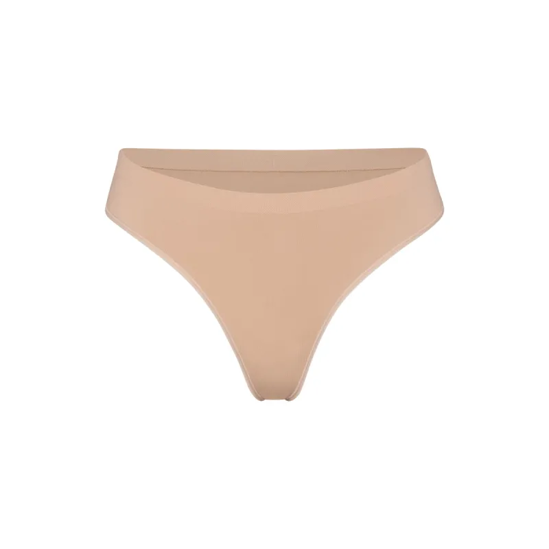 SOFT SMOOTHING SEAMLESS THONG | CLAY sold by SKIMS