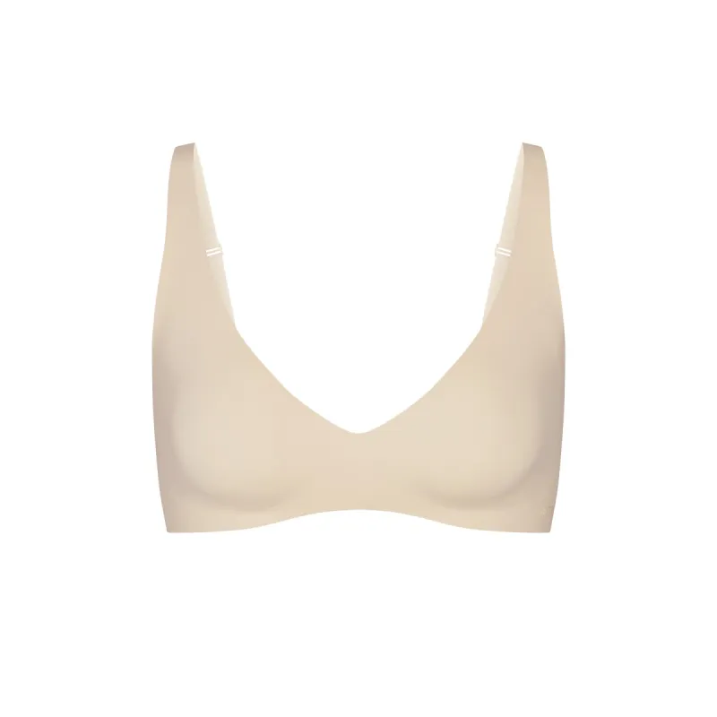 NAKED PLUNGE BRALETTE | SAND sold by SKIMS