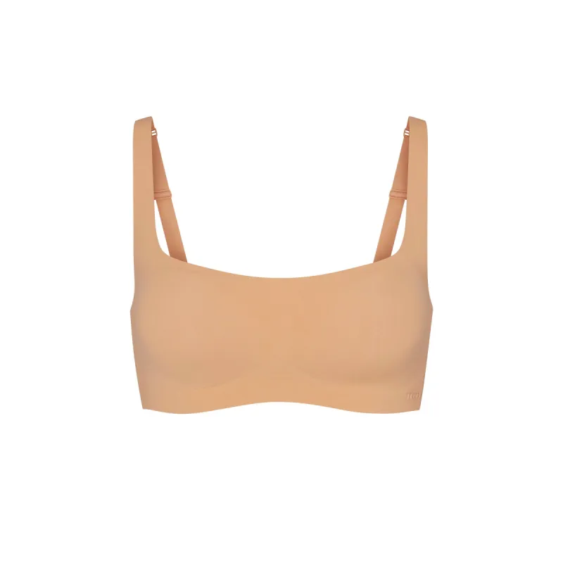 NAKED SCOOP BRALETTE | OCHRE sold by SKIMS
