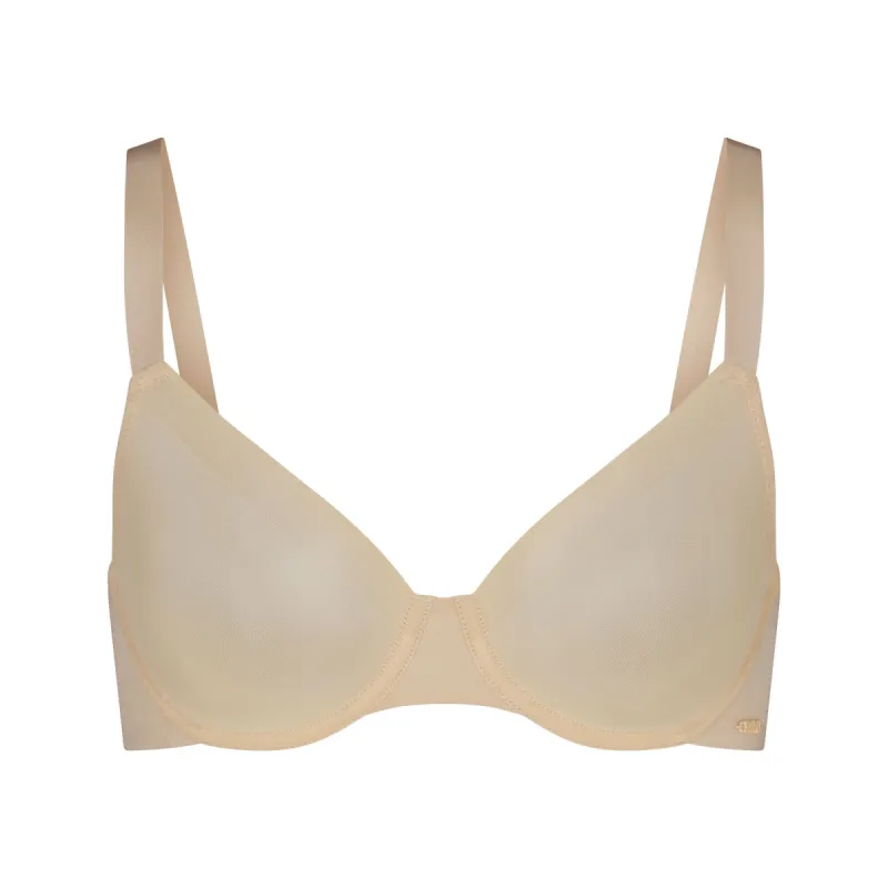 NO SHOW UNLINED DEMI BRA | SAND sold by SKIMS