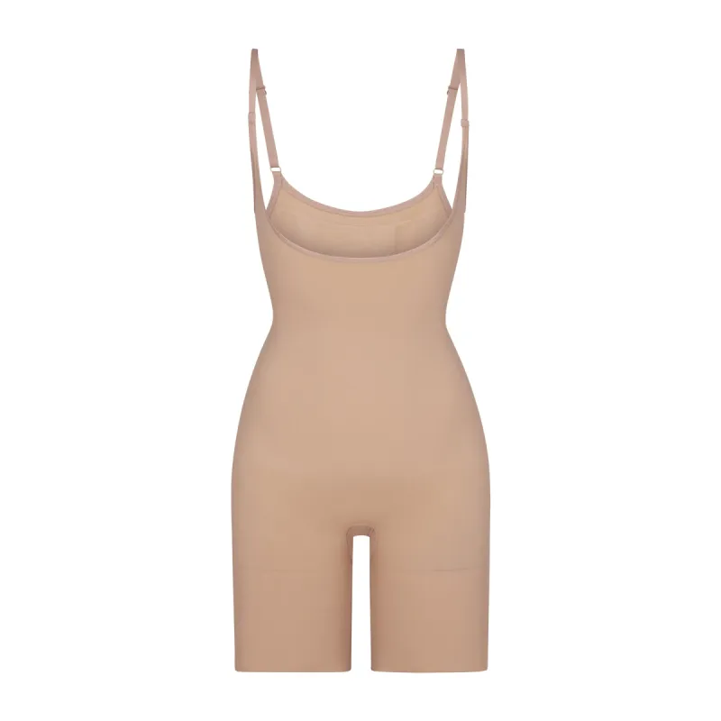 SEAMLESS SCULPT BUTT LIFTING OPEN BUST BODYSUIT | CLAY sold by SKIMS
