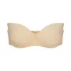 SMOOTHING INTIMATES UNLINED STRAPLESS BRA | SAND sold by SKIMS