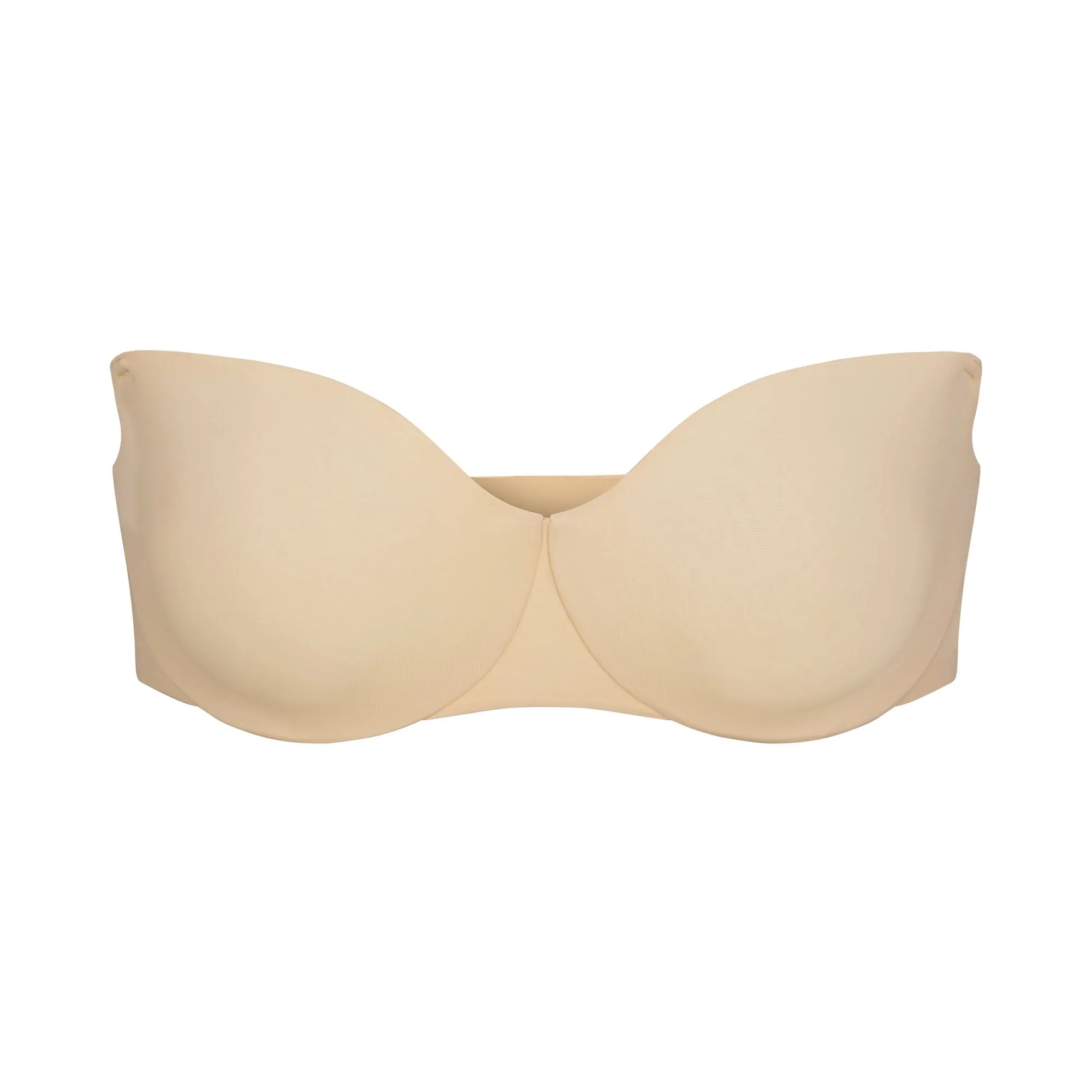 SMOOTHING INTIMATES UNLINED STRAPLESS BRA | SAND sold by SKIMS