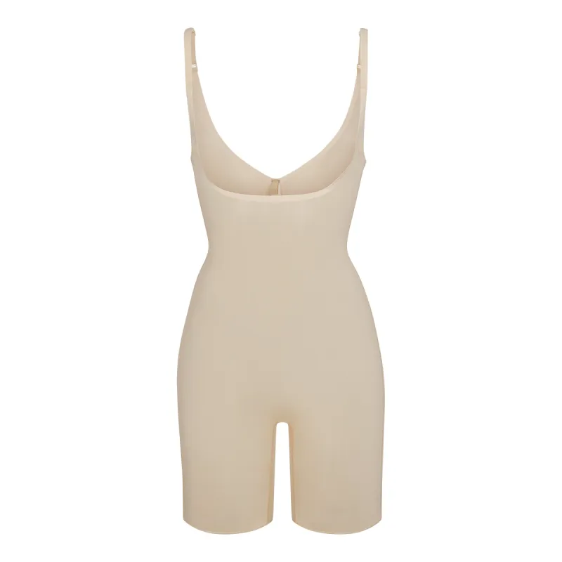 SHEER SCULPT OPEN BUST BODYSUIT | SAND sold by SKIMS
