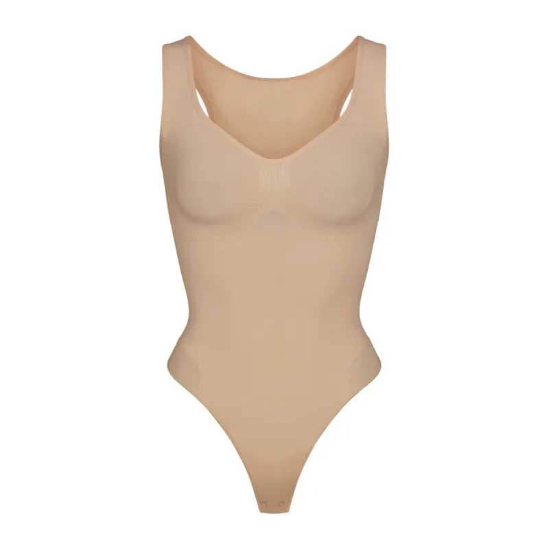 SEAMLESS SCULPT SCOOP NECK THONG BODYSUIT | CLAY sold by SKIMS