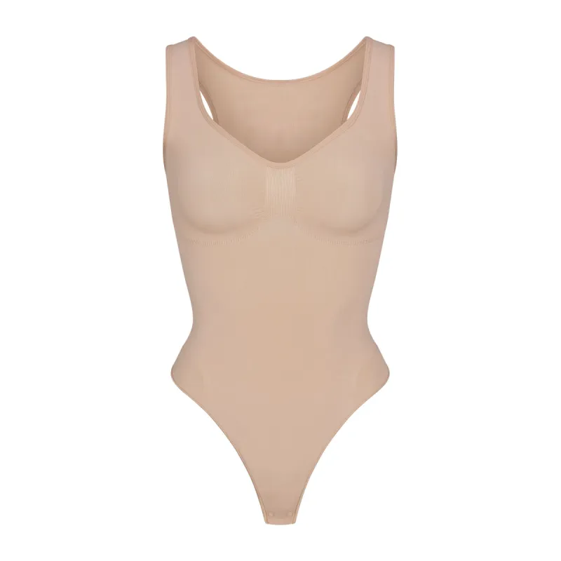 SEAMLESS SCULPT SCOOP NECK THONG BODYSUIT | MICA sold by SKIMS
