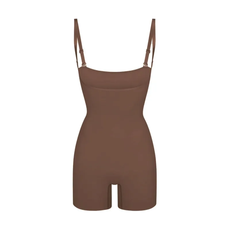 SEAMLESS SCULPT OPEN BUST SHORTIE BODYSUIT | JASPER sold by SKIMS