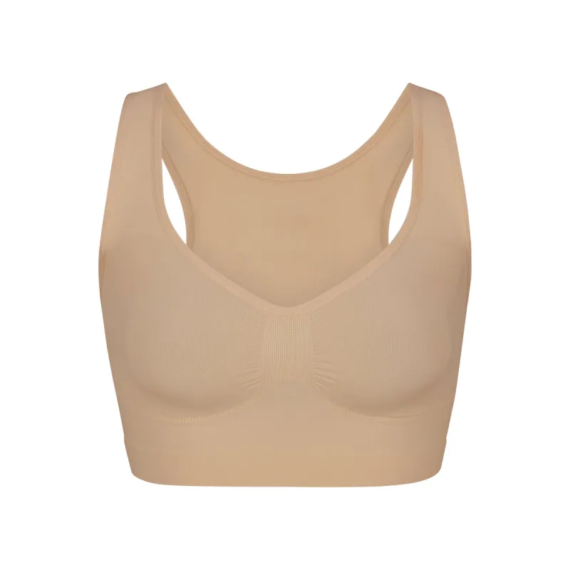 SEAMLESS SCULPT SCOOP PLUNGE BRALETTE | CLAY sold by SKIMS