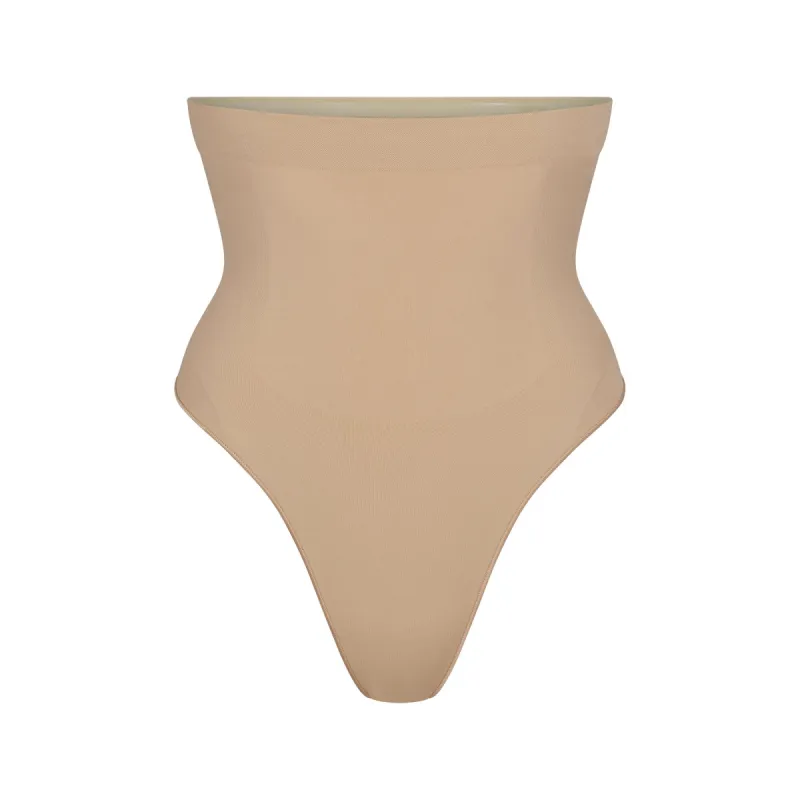 SEAMLESS SCULPT HIGH-WAISTED THONG | CLAY sold by SKIMS