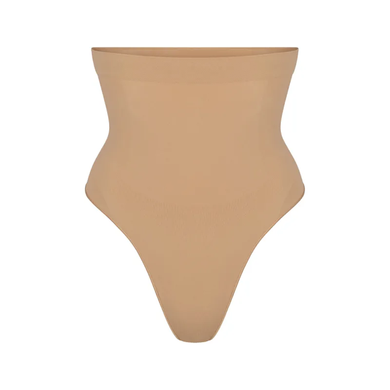 SEAMLESS SCULPT HIGH-WAISTED THONG | OCHRE sold by SKIMS