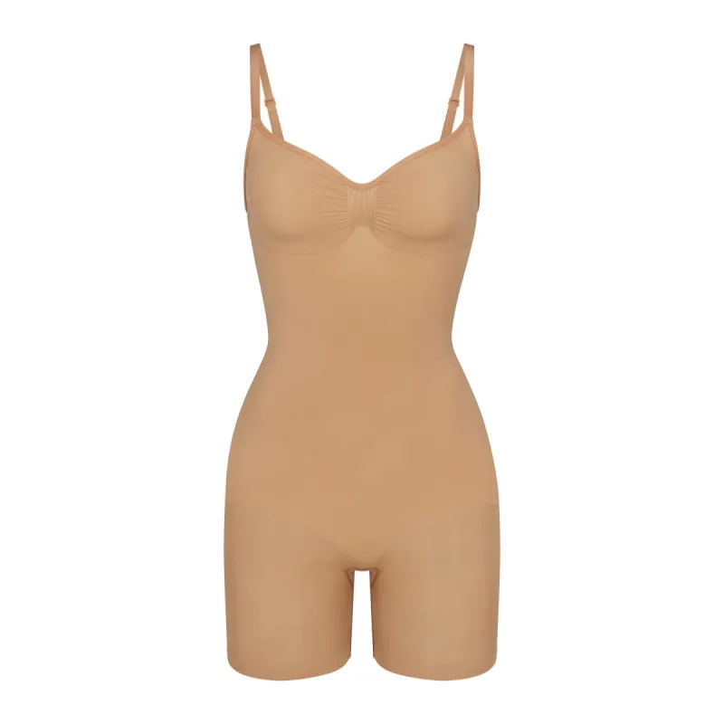 SEAMLESS SCULPT MID THIGH BODYSUIT | OCHRE sold by SKIMS