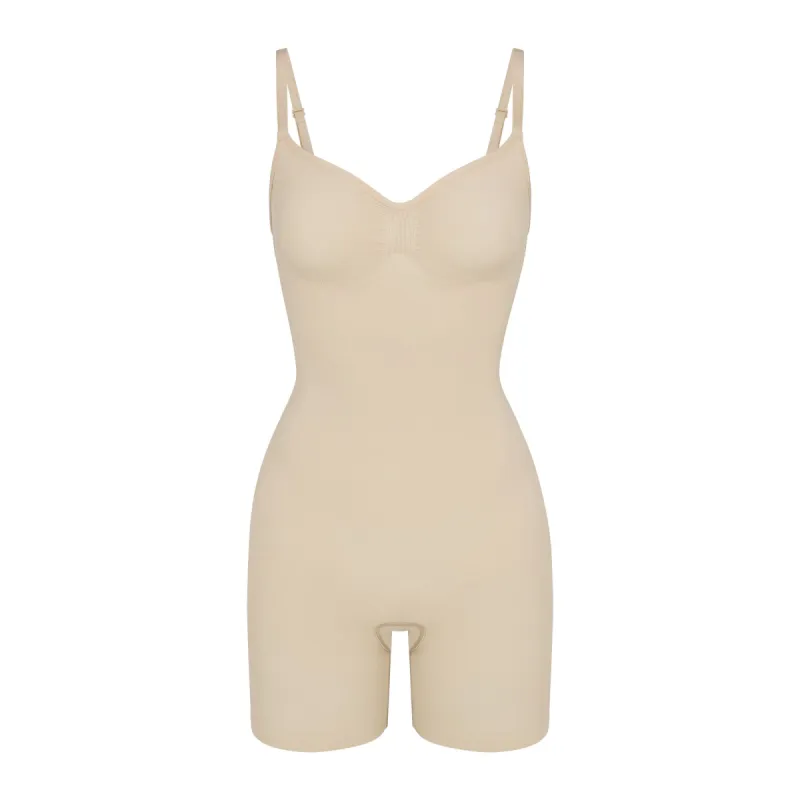 SEAMLESS SCULPT MID THIGH BODYSUIT | SAND sold by SKIMS