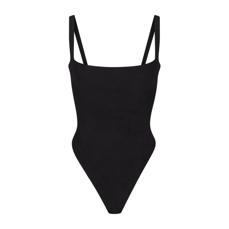 TERRY LOUNGE SEAMLESS BODYSUIT | ONYX sold by SKIMS
