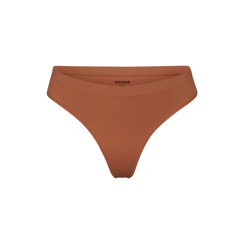 SOFT SMOOTHING SEAMLESS THONG | BRONZE sold by SKIMS